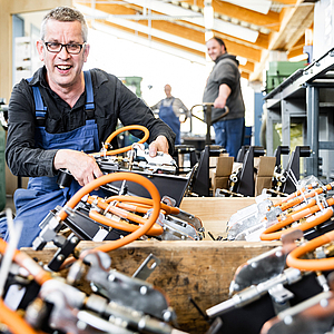 drei Männer der Werkstatt Afferde bei der Arbeit